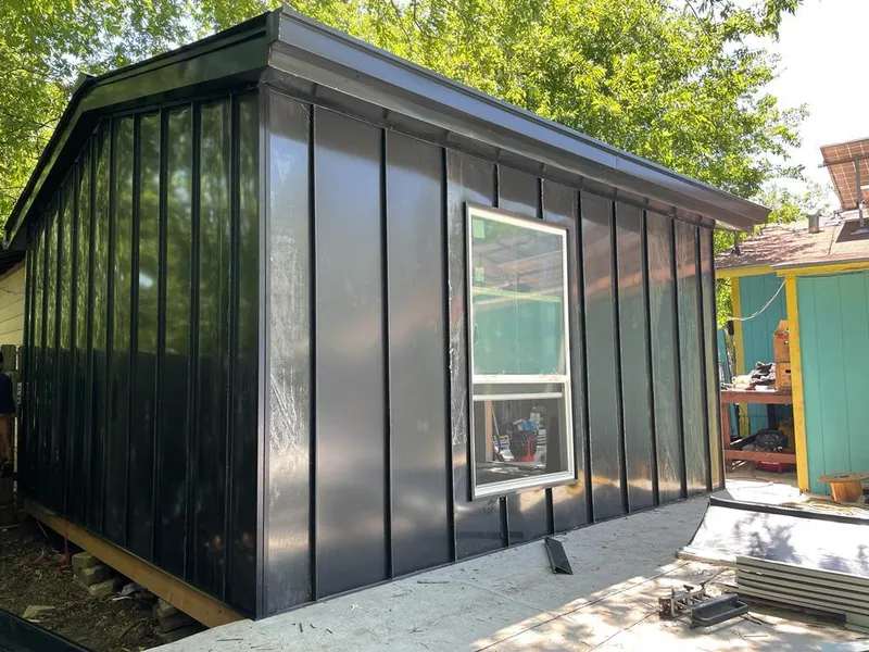 Black standing seam metal wall panels for Metal Roof Installation in Buffalo