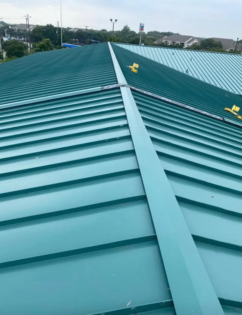 Green commercial metal roof ridge and valley for Metal Roof Repair in Buffalo